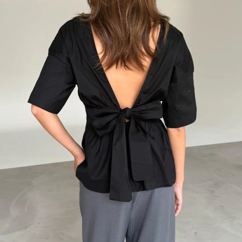 Backless Bow Tie Peplum Waist Blouse - Black