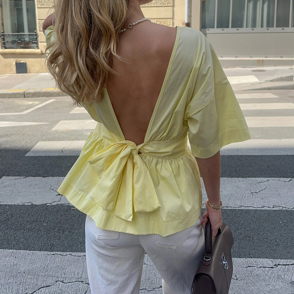 Backless Bow Tie Peplum Waist Blouse - Yellow