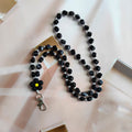 Beaded Phone Lanyard with Flower Charm and Clip - Black