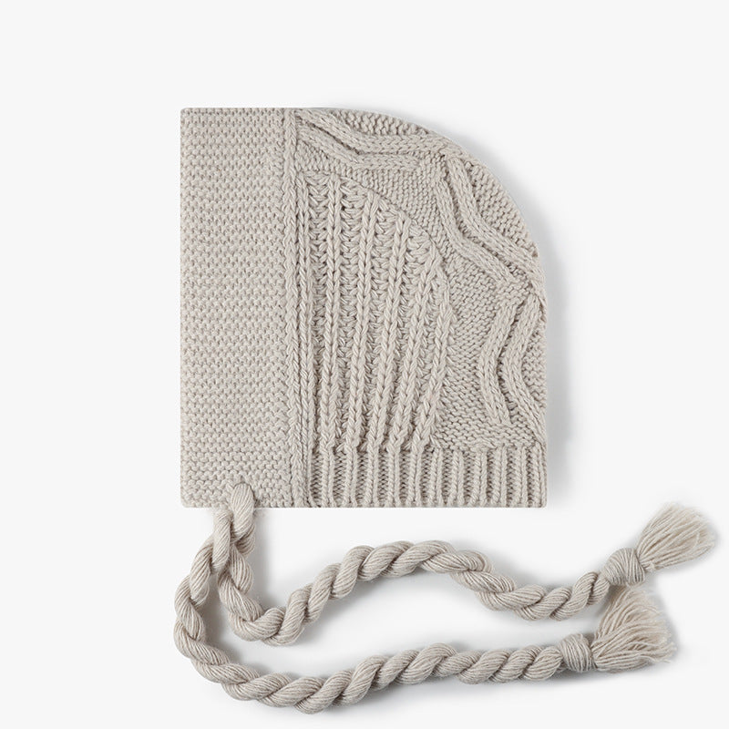 Cable Knit Bonnet Beanie With Tassel Ties - Apricot