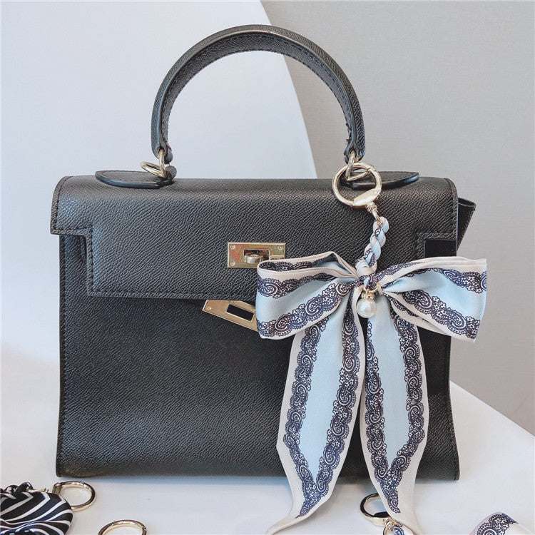 Pearl Accent Satin Bow Bag Charm - view 1