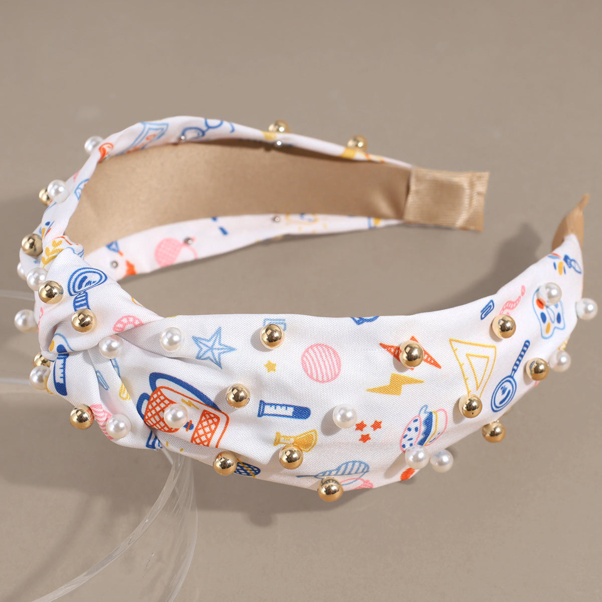 Pearl-Studded Top-Knot Headband with School-Print Motif - White