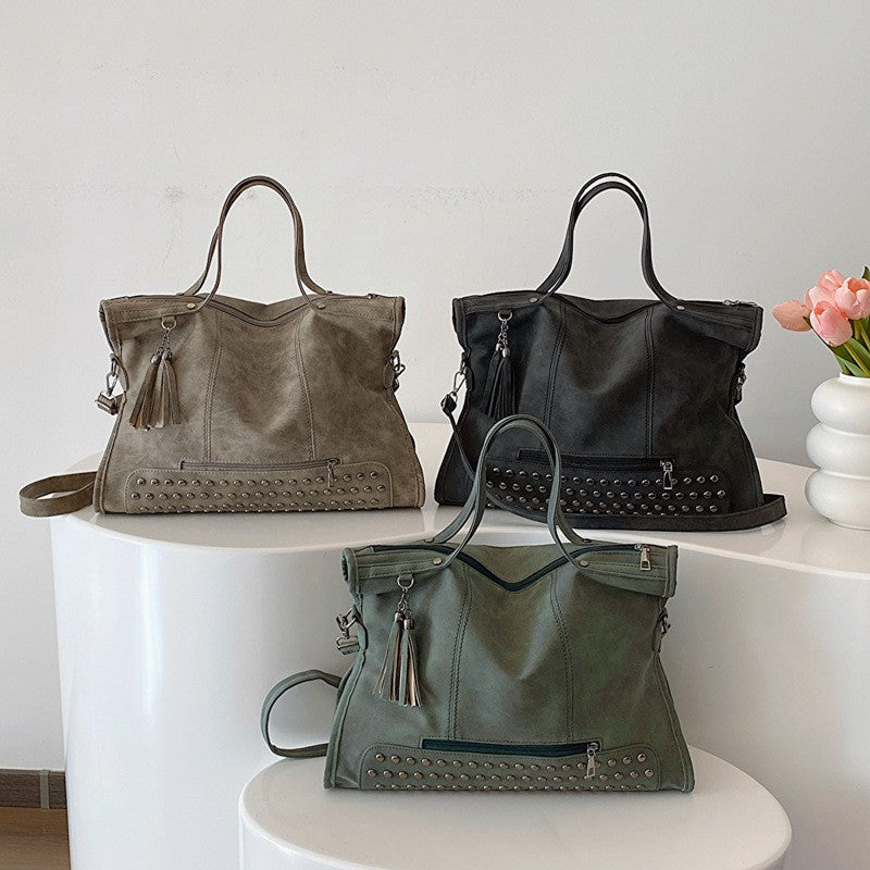 Studded Slouchy Tote Bag with Tassel Charm