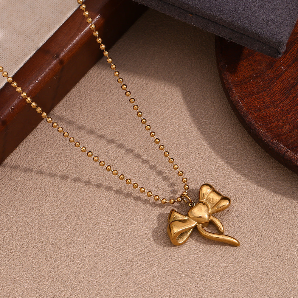 Sculptural Puffy Bow Beaded Chain Necklace