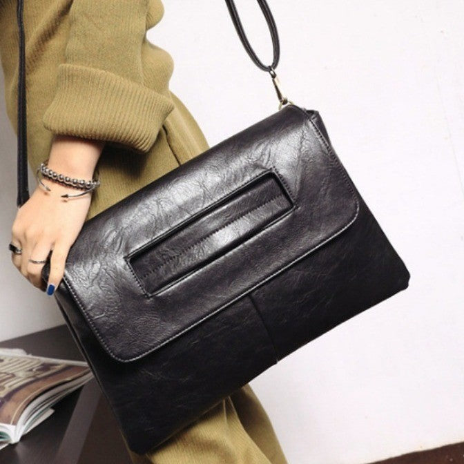 Oversized Envelope Clutch With Cut-Out Handle