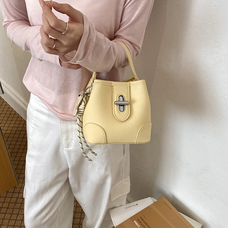 Mini Turn Lock Bucket Bag with Crossbody Strap