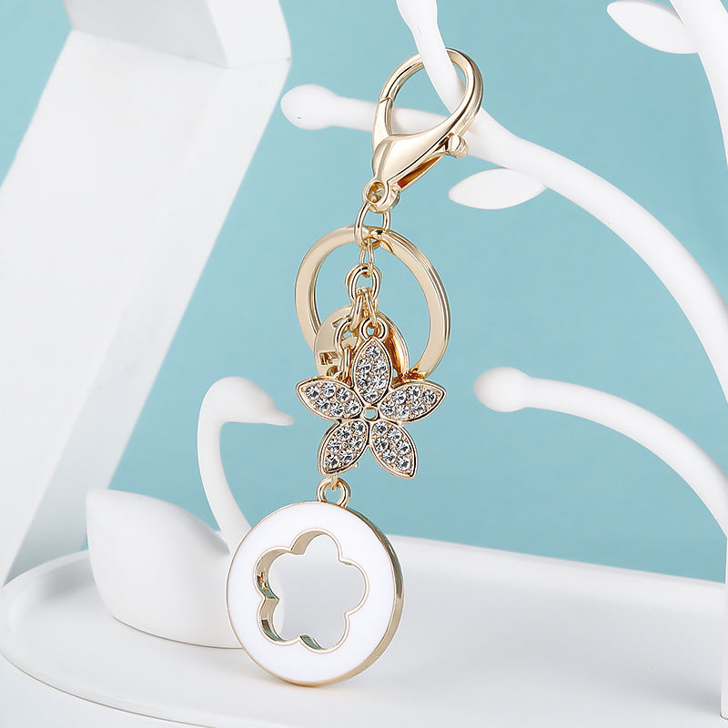 Clover Charm Rhinestone Butterfly Keychain - White