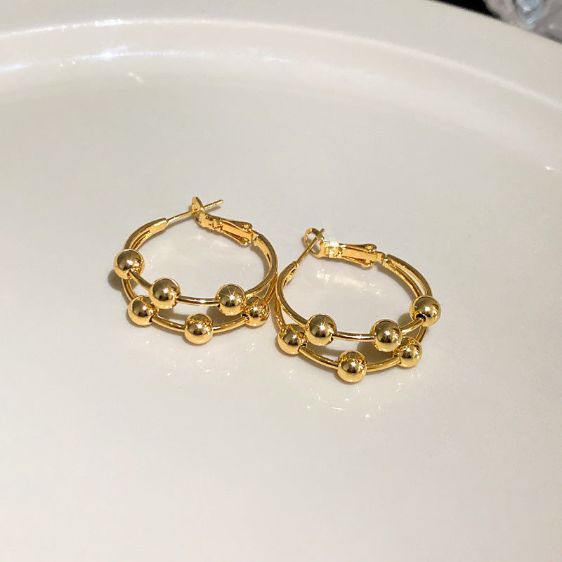 Sculptural Twisted Metal Hoop Earrings - NO22