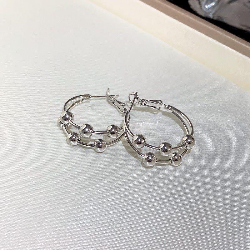 Sculptural Twisted Metal Hoop Earrings - NO23