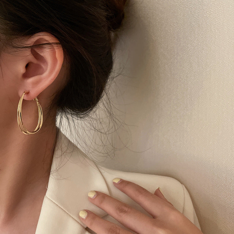 Sculptural Twisted Metal Hoop Earrings - view 4