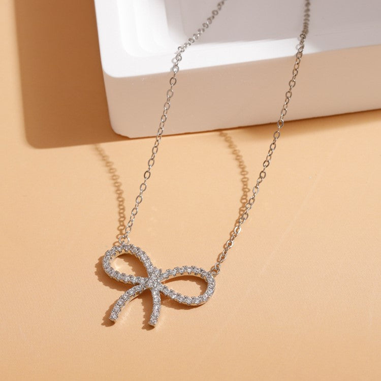 Pave Ribbon Bow Pendant Necklace - view 1