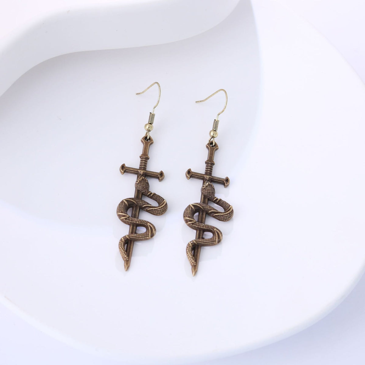 Gothic Coiled Snake Dagger Dangle Earrings - Brown