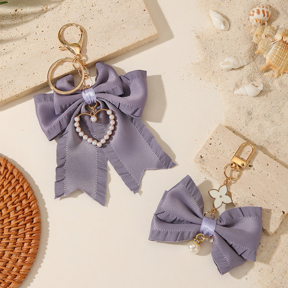 Pleated Bow Keychain With Beaded Heart Charm - view 1