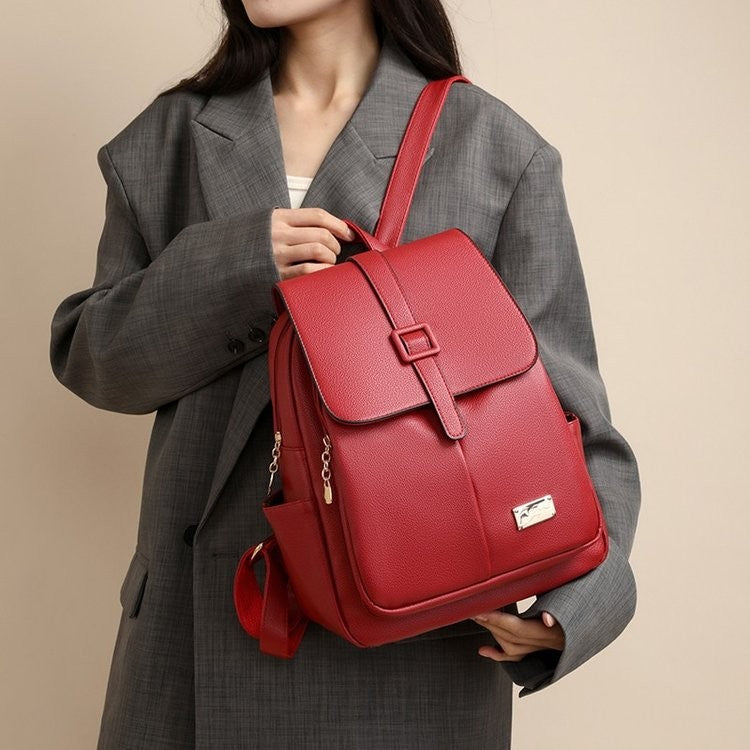 Buckle Flap Pebbled Faux Leather Backpack