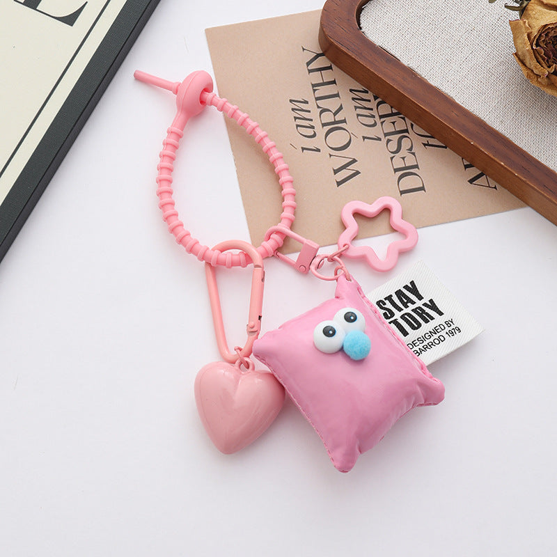 Smiley Pillow Charm With Heart Pendant - Pink