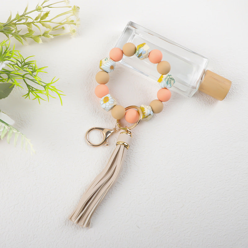 Marbled Bead Wristlet Keychain With Tassel Fringe - Orange