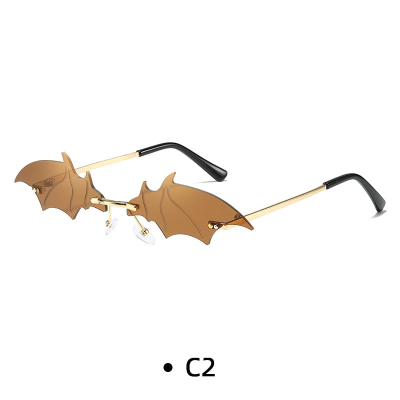 Rimless Bat Wing Novelty Sunglasses - Tea
