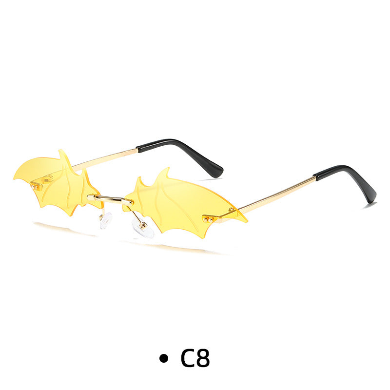 Rimless Bat Wing Novelty Sunglasses - Yellow