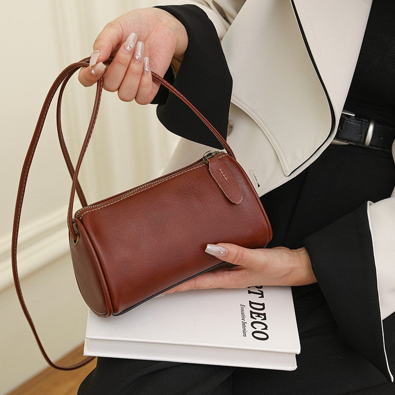 Mini Leather Barrel Crossbody Bag