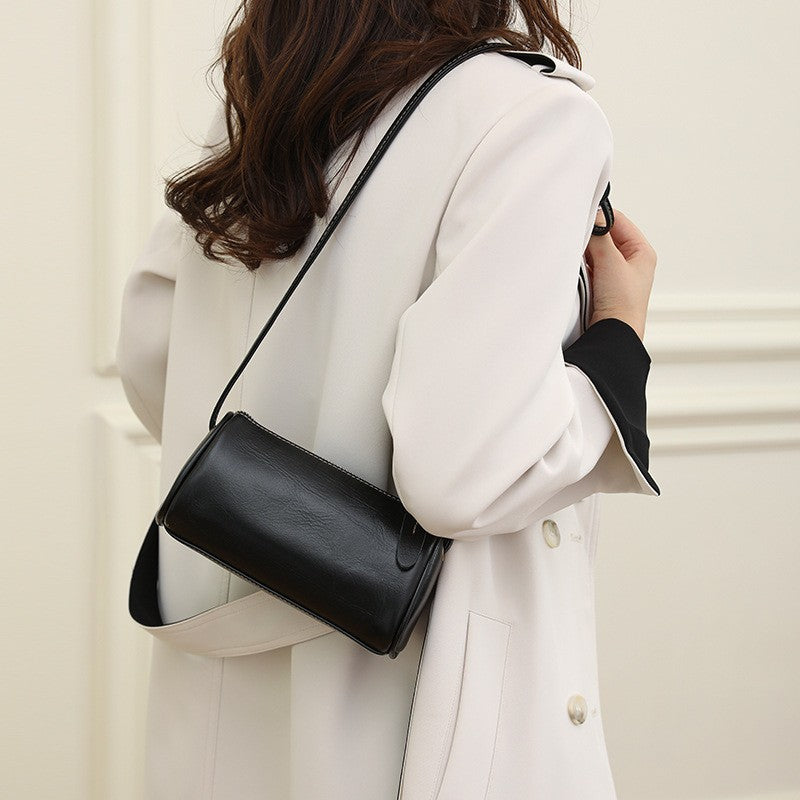 Mini Leather Barrel Crossbody Bag