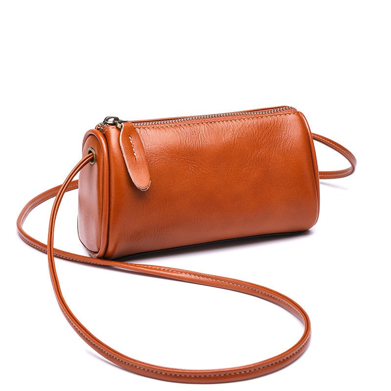 Mini Leather Barrel Crossbody Bag