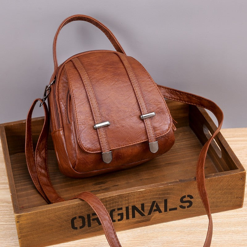 Mini Dome Top Handle Crossbody Bag
