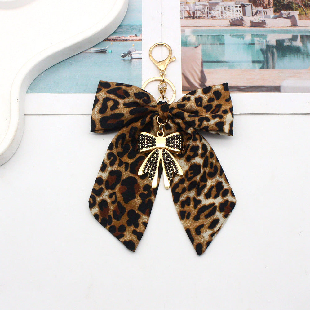Oversized Leopard Bow Keychain with Sparkling Bow Drop - Black
