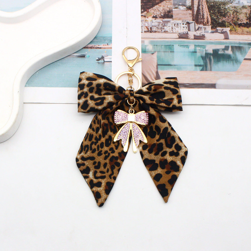 Oversized Leopard Bow Keychain with Sparkling Bow Drop - Purple