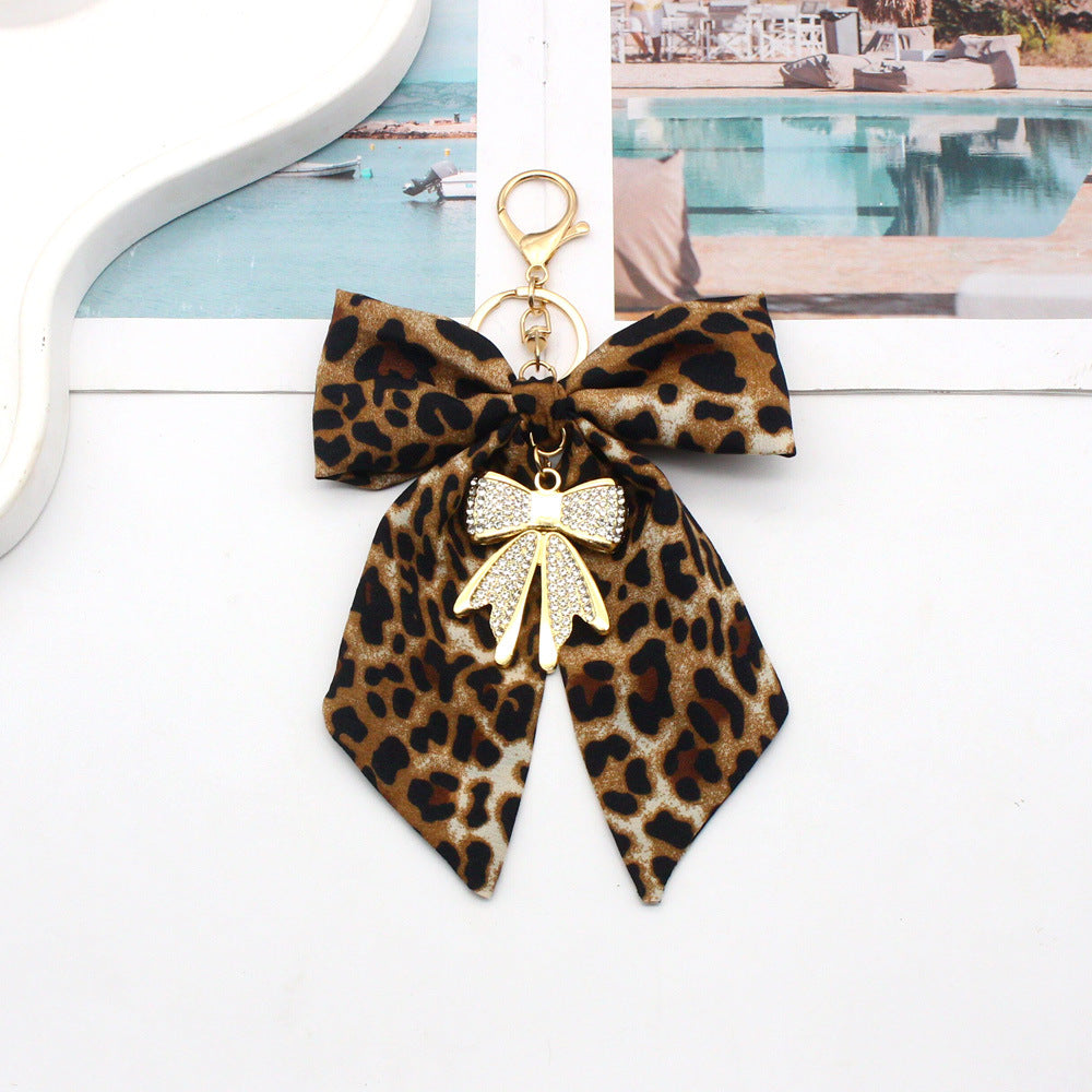 Oversized Leopard Bow Keychain with Sparkling Bow Drop - White