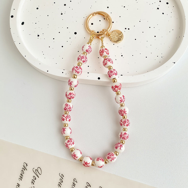 Painted Floral Bead Wristlet Keychain With Coin Charm - Color_02