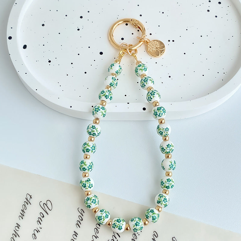 Painted Floral Bead Wristlet Keychain With Coin Charm - Color_05