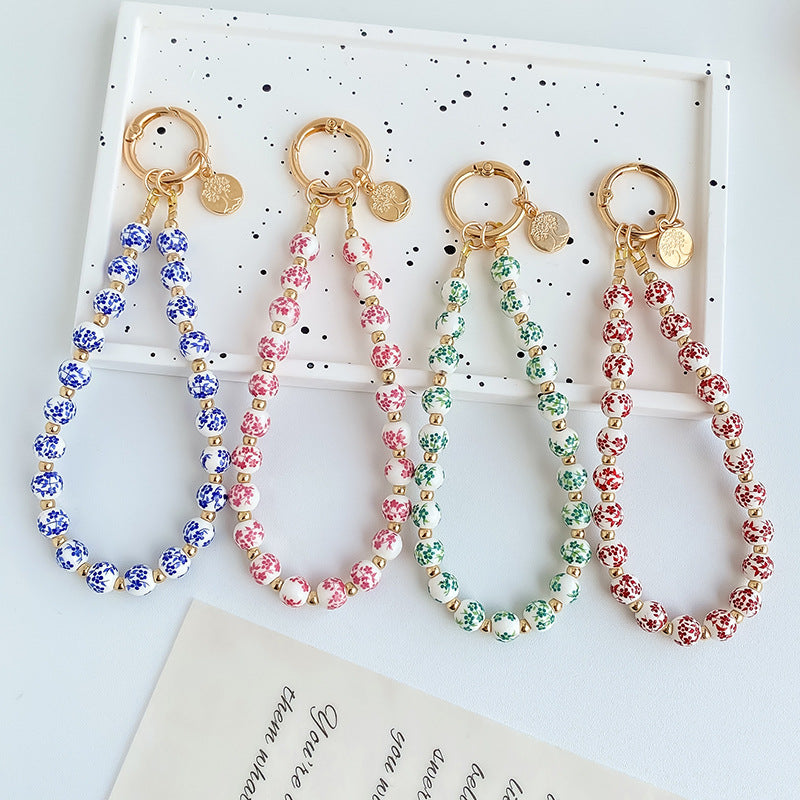 Painted Floral Bead Wristlet Keychain With Coin Charm - view 2