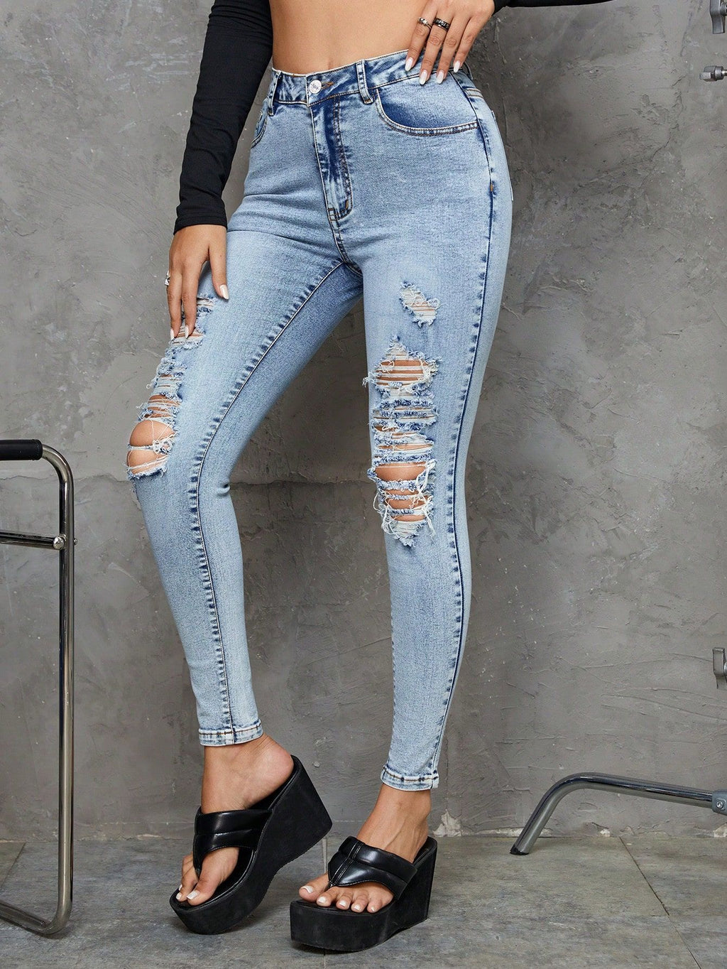 Light Wash Ripped High Rise Skinny Jeans - view 1
