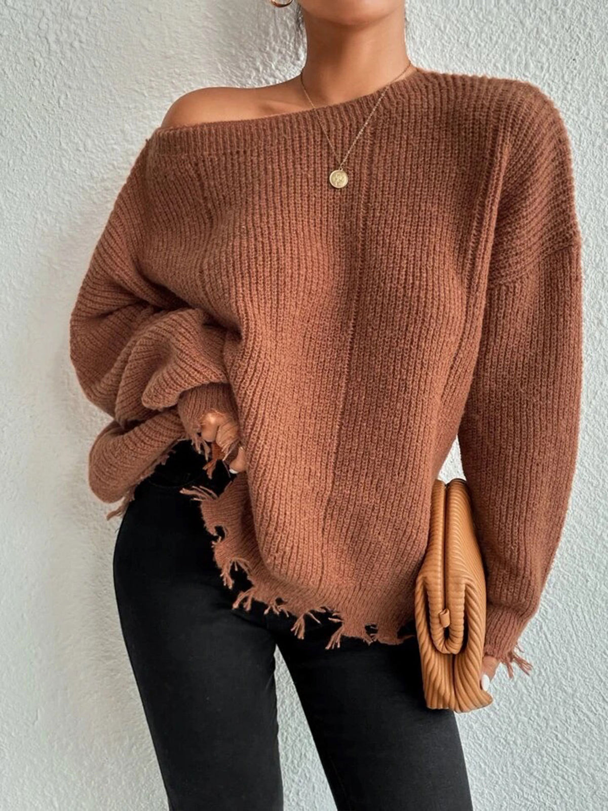 Distressed Fringe Hem Loose Knit Sweater