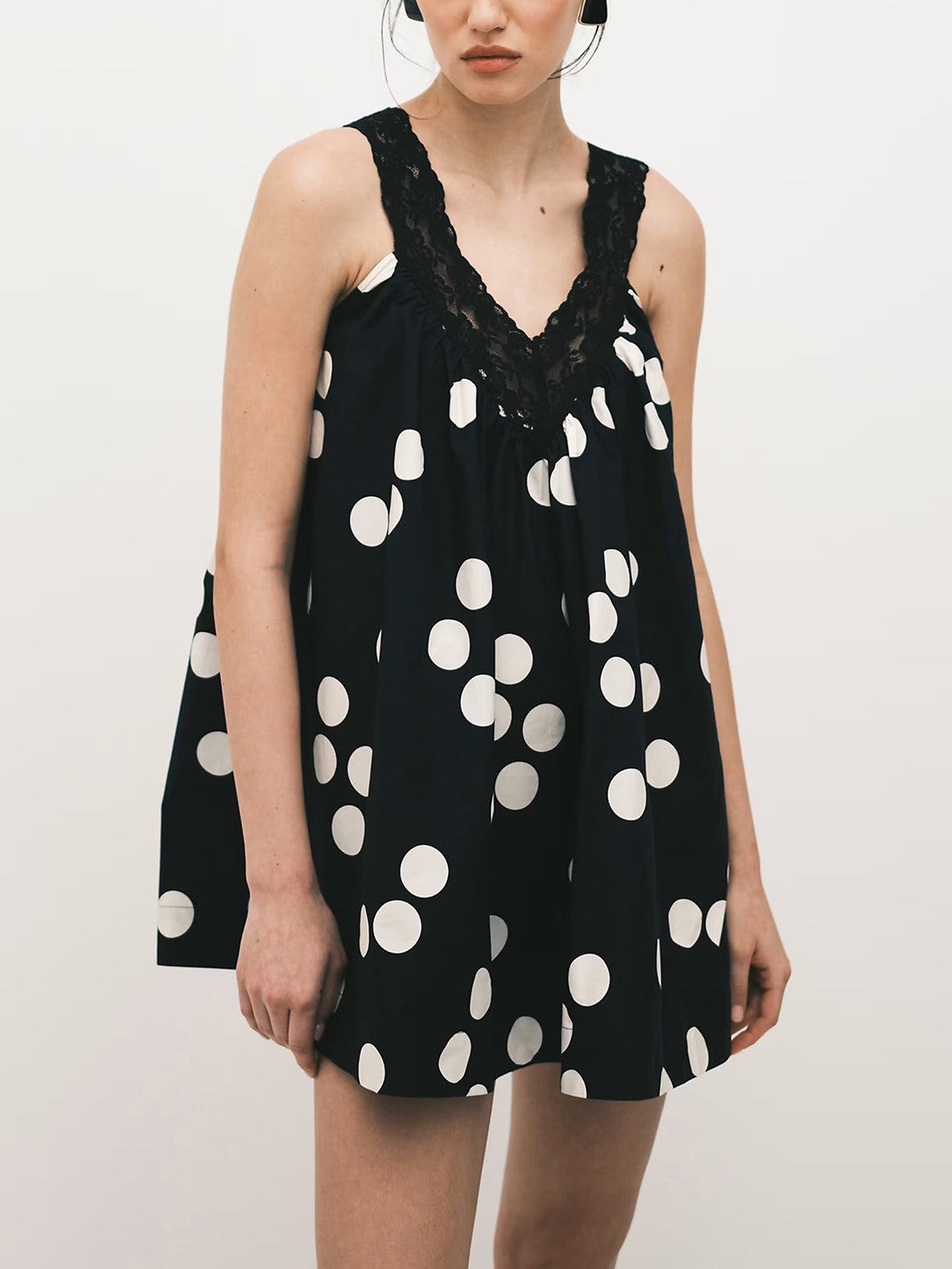 Polka Dot Babydoll Mini Dress With Tie Back - Black