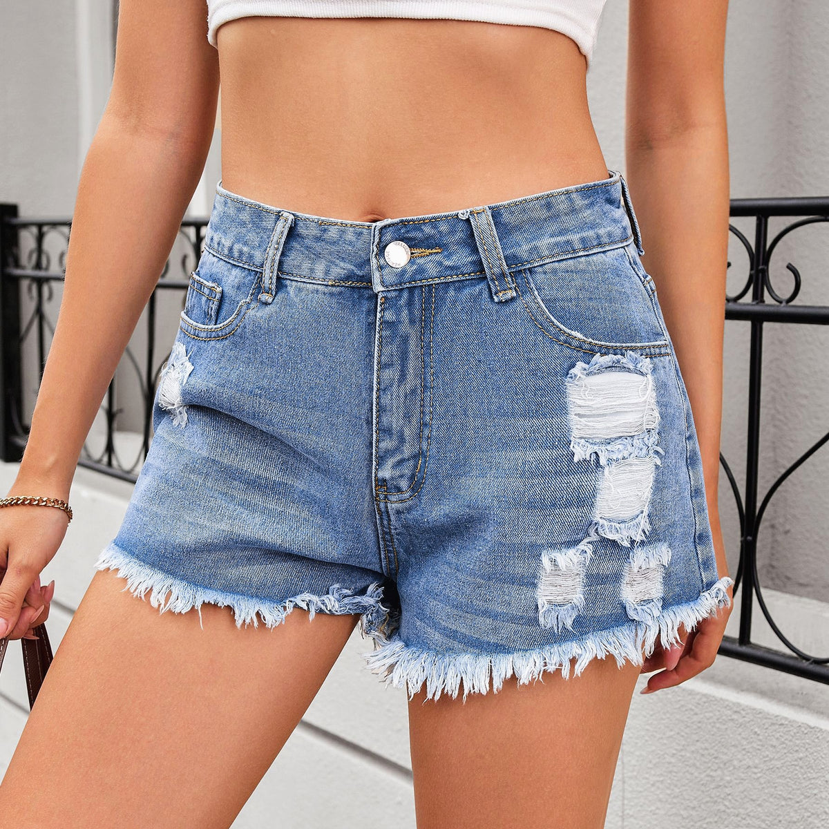High Rise Ripped Raw Hem Denim Shorts - view 1