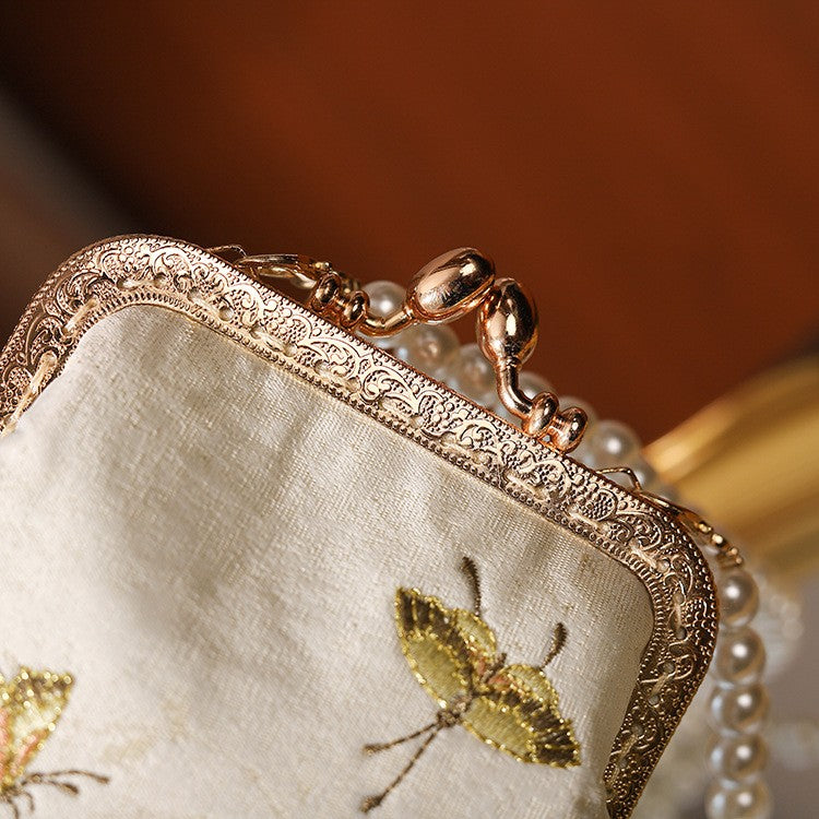 Embroidered Floral Pearl Handle Kiss Lock Bag