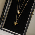 Layered Starfish And Shell Charm Necklace - Gold
