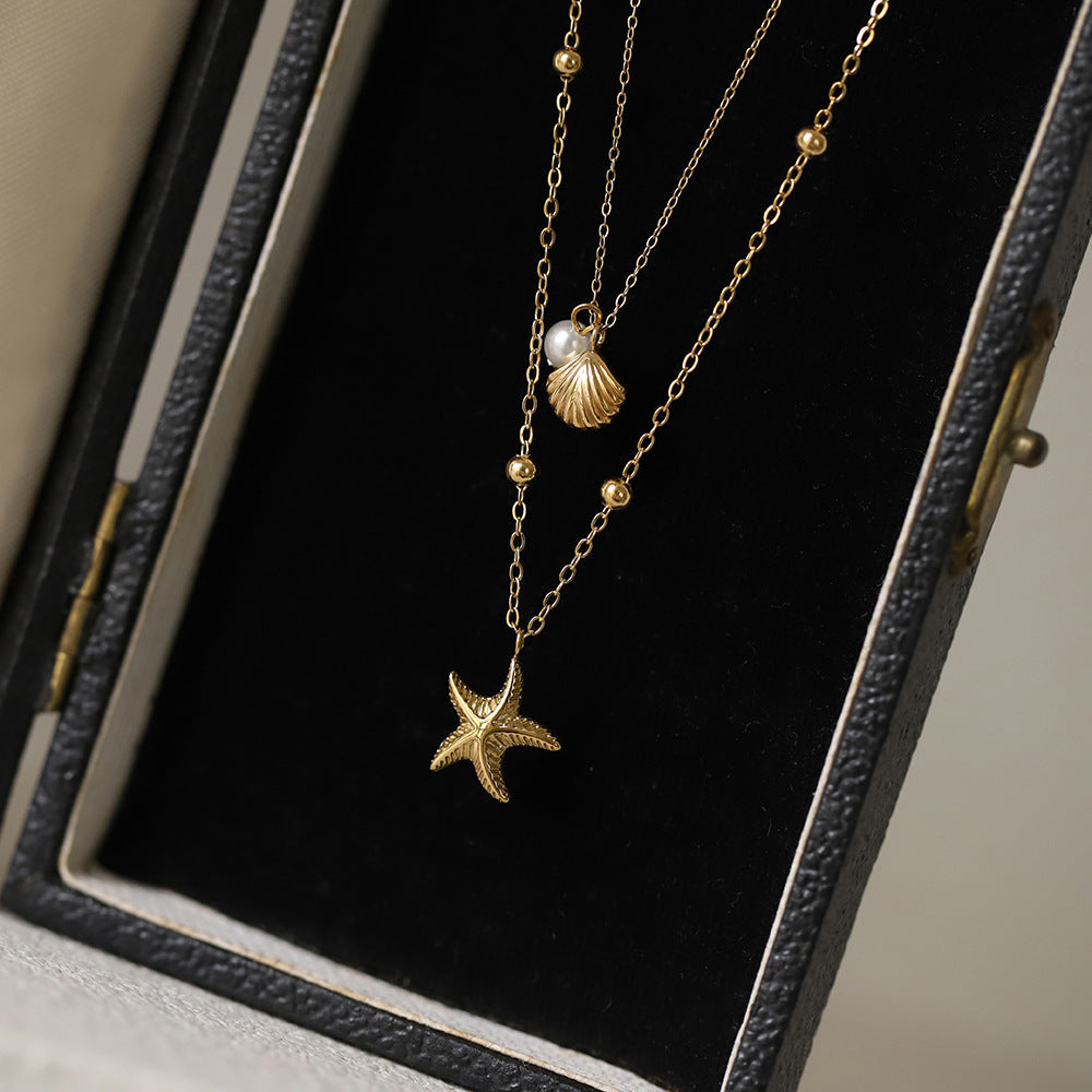 Layered Starfish And Shell Charm Necklace - Gold