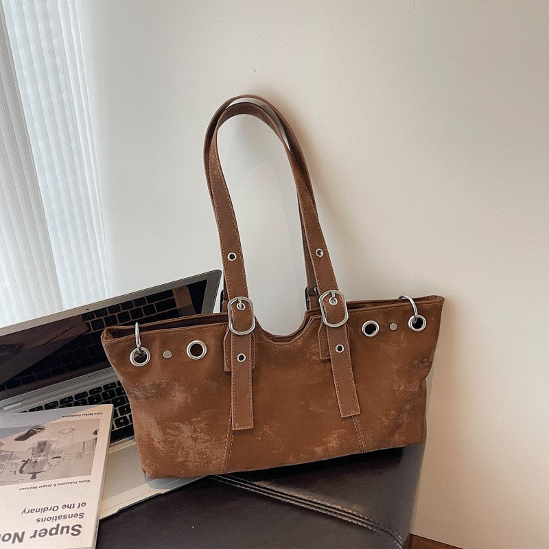 Distressed Grommet Buckle Shoulder Bag