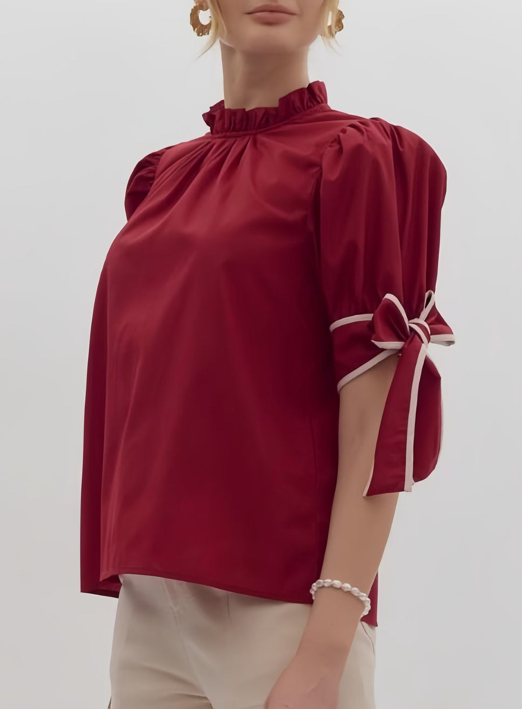 Ruffle Mock Neck Bow Cuff Top - view 1