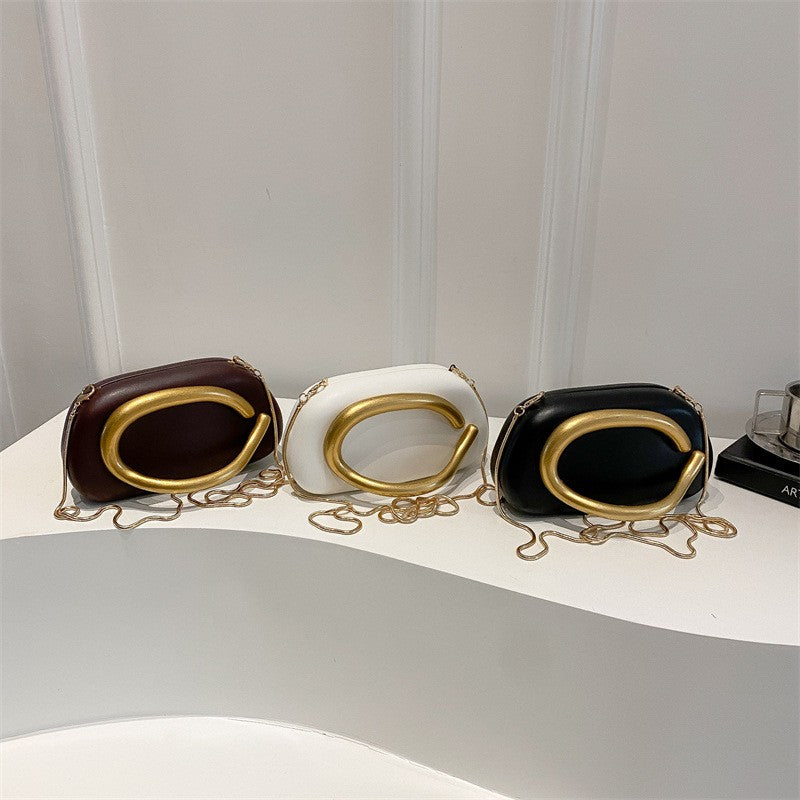 Oval Pillow Clutch with Curved Metal Handle
