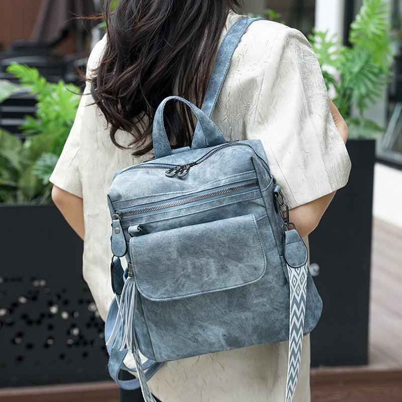 Distressed Tassel Backpack with Guitar Strap