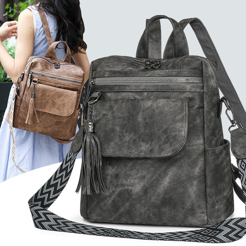 Distressed Tassel Backpack with Guitar Strap