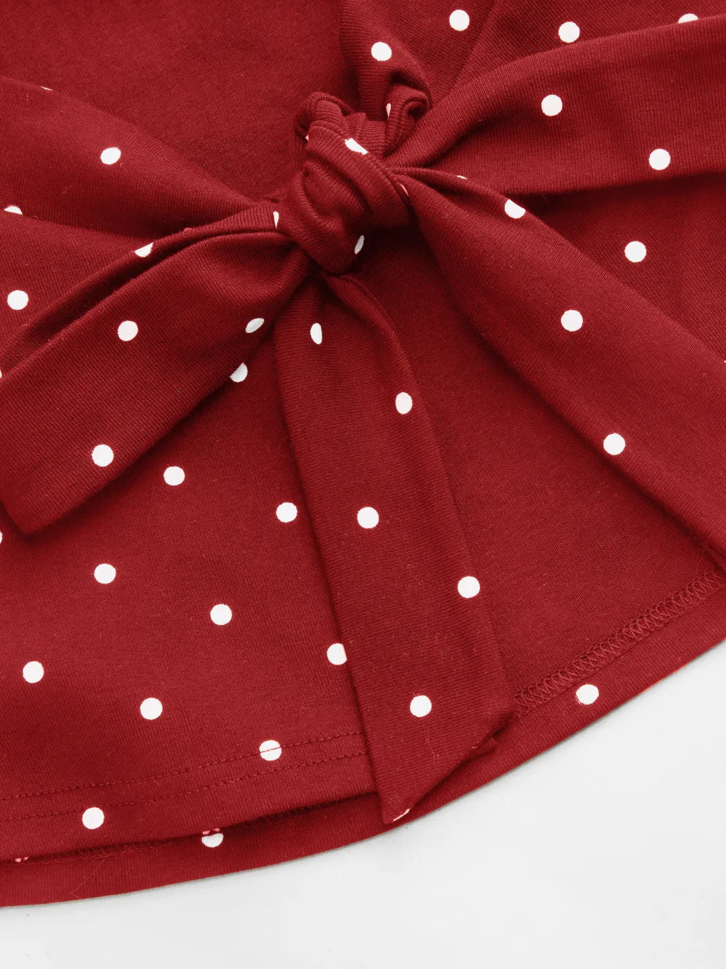 Ruched Polka Dot Knit Top With Bow Back - view 7