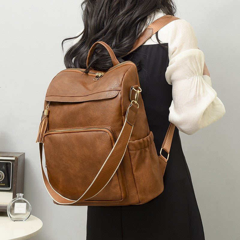 Roomy Faux Leather Backpack Purse with Tassel