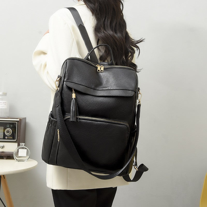 Roomy Faux Leather Backpack Purse with Tassel