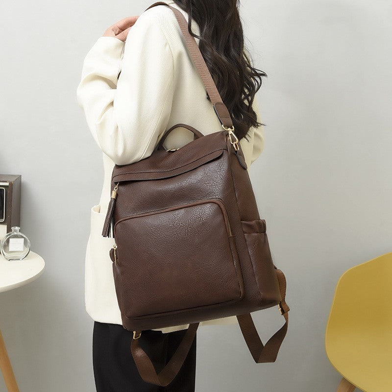 Roomy Faux Leather Backpack Purse with Tassel