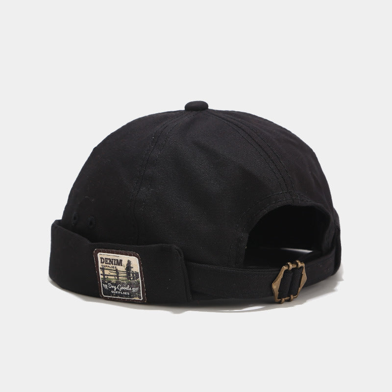 Brimless Bowler Hat with Woven Patch - black