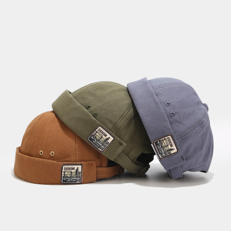 Brimless Bowler Hat with Woven Patch